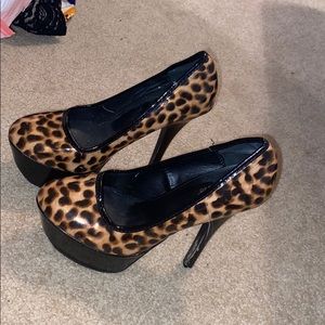 Leopard and black high heels